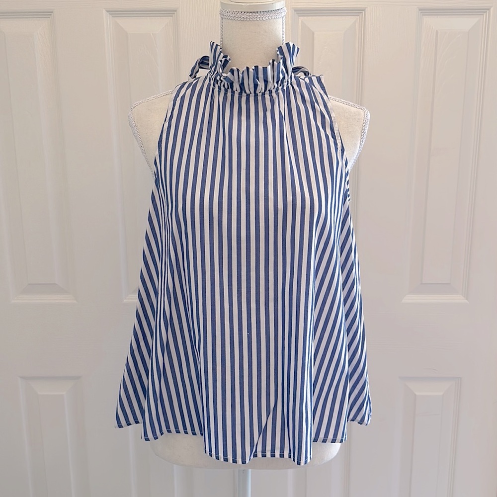 Blue and white striped sleeveless halter top with a bow in back. Worn 2x.